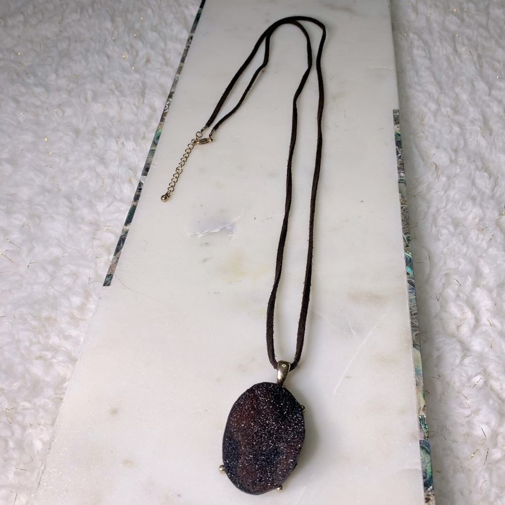 Brown stone medallion pendant on leather cord string necklace